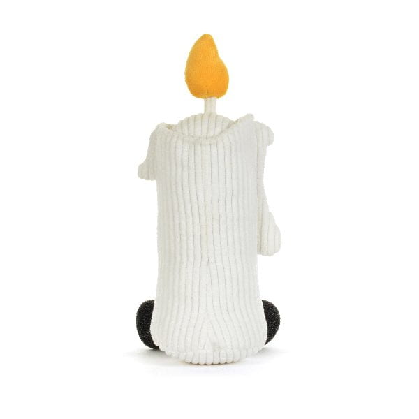 A white ribbed corduroy plush candle toy with a yellow-orange flame on top and small black feet, shown from the back on a white background.