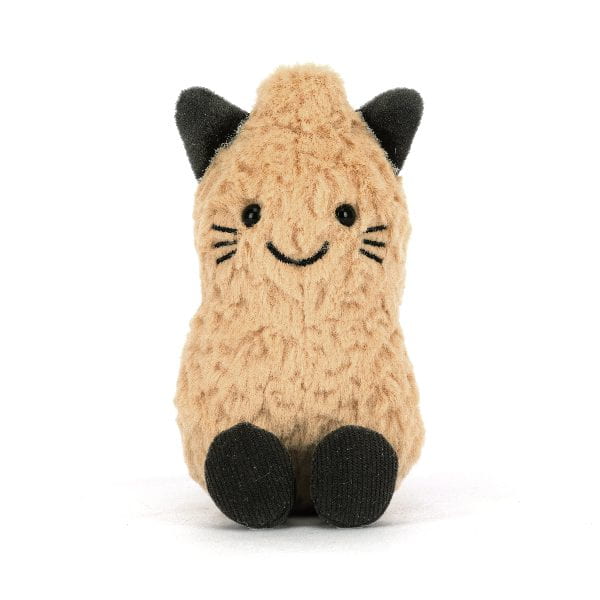 Stuffed animal toy resembling a cat with black accents on a white background