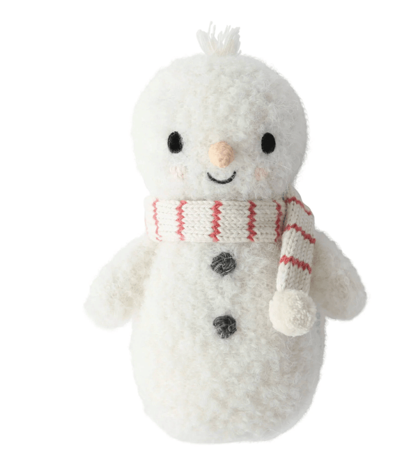 A plush white snowman toy with a knitted cream and red striped scarf, black button eyes, and a small orange carrot nose, isolated on a white background.