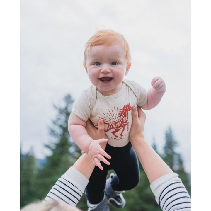 The Montana Scene- Wild &amp; Free Onesie - Heather Natural Onesie The Montana Scene
